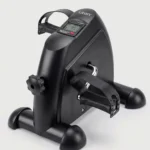 بدال جهاز، (Mini Exercise Bike) تمرين بدواسة (للذراعين والساقين) دراجة للقدم تحت المكتب وللذراعين، دراجة تمارين صغيرة محمولة، مع شاشة LCD ديجيتال، اسود