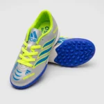 حذاء كرة قدم (ترتان/ستارز) من ماركة Adidas للأطفال من الجنسين، فضي