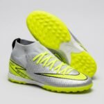 حذاء كرة قدم (ترتان/ستارز) برقبة عالية، من ماركة Nike للبالغين من الجنسين، أصفر