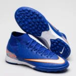 حذاء كرة قدم (ترتان/ستارز) برقبة عالية، من ماركة Nike للبالغين من الجنسين، أزرق