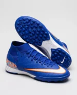حذاء كرة قدم (ترتان/ستارز) برقبة عالية، من ماركة Nike للبالغين من الجنسين، أزرق