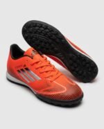 حذاء كرة قدم (ترتان/ستارز) من ماركة Adidas للبالغين من الجنسين، أحمر*أسود